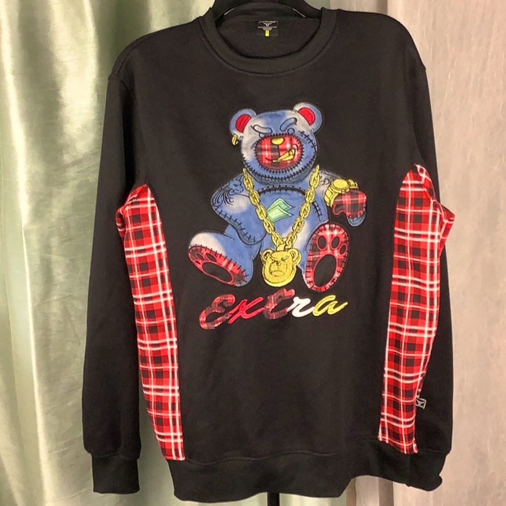 Screenshot EXTRA Bear. Size Medium. Blue bear with gold chain.
